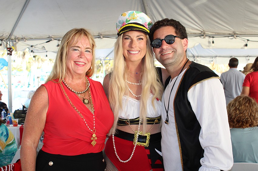 Diane Sterner, Courtney Warner and Charlie Shrem opt for pirate attire.