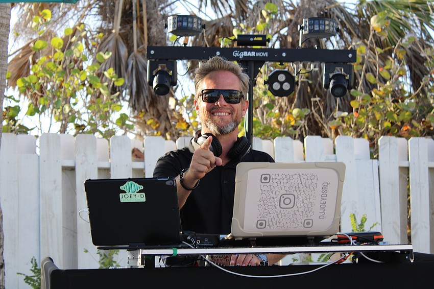 Joey-D deejays at the Lido Key Residents Association beach party.