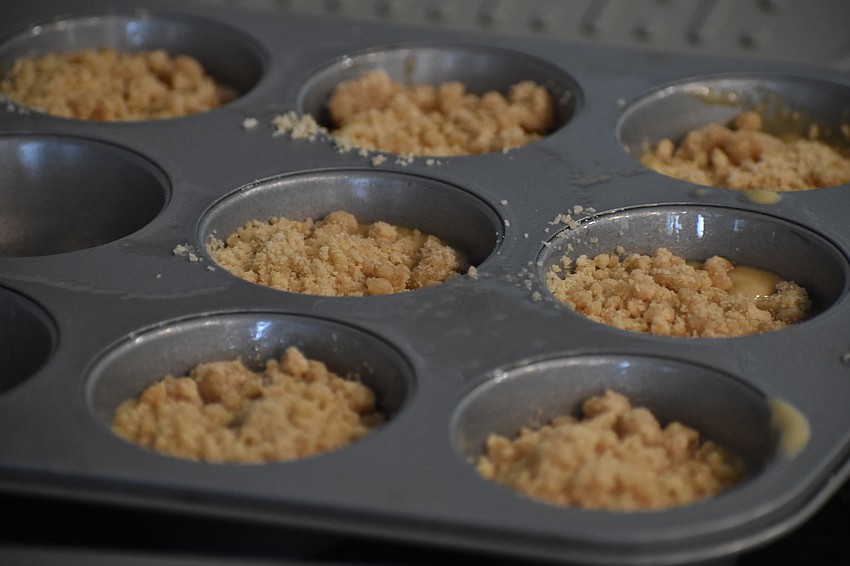 Coffee cupcakes get ready to go in the oven.