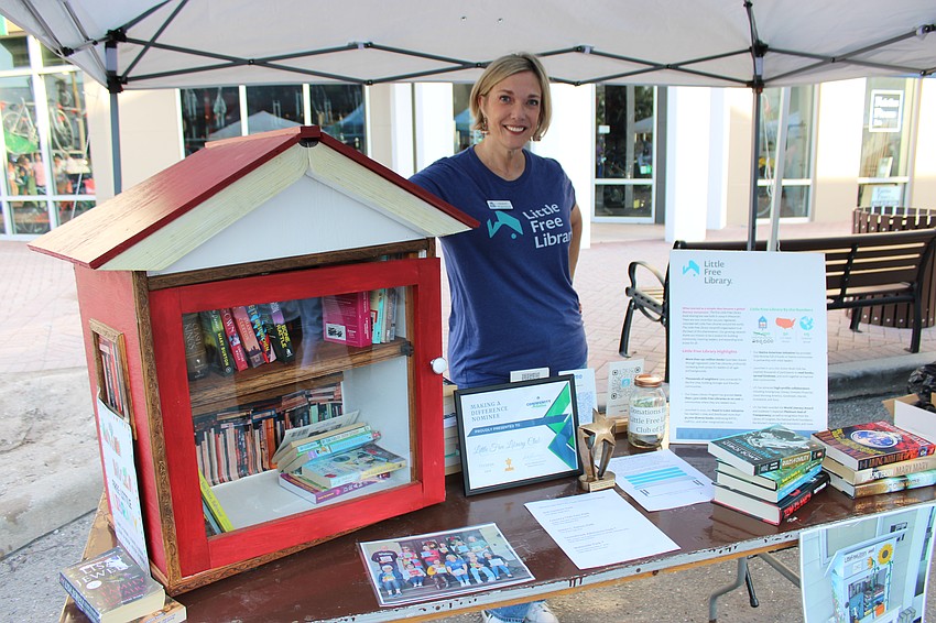 Elizabeth Henderson brought a Little Free Library with her to the Block Party and Club Day at Main Street at Lakewood Ranch.