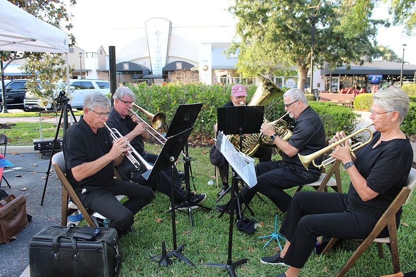 The Lakewood Ranch Wind Ensemble was performing and raising awareness of its band at the Block Party and Club Day.