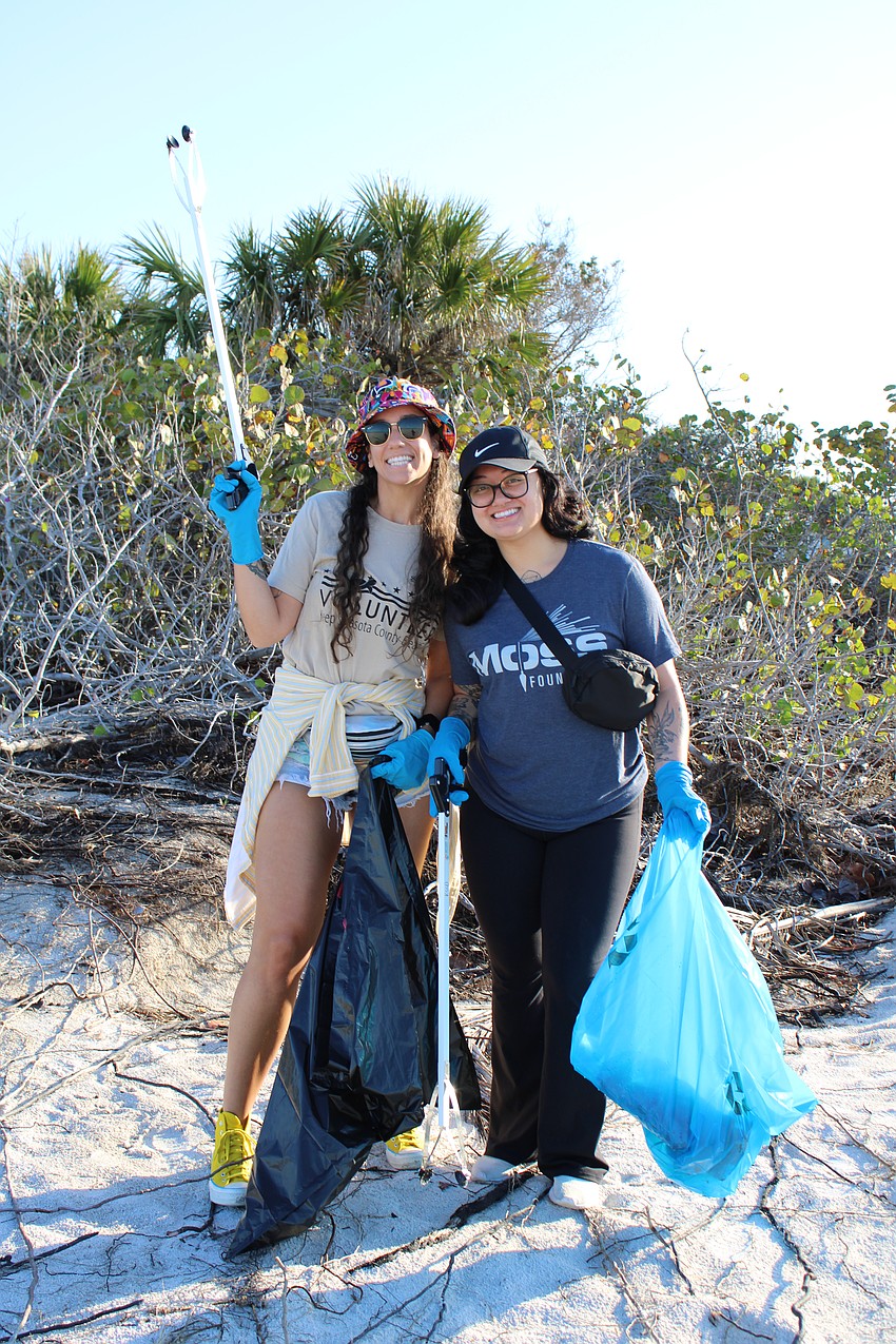 Stephanie King and Casey Anderson of Moss said they were glad to pitch in for the Saturday morning cleanup.