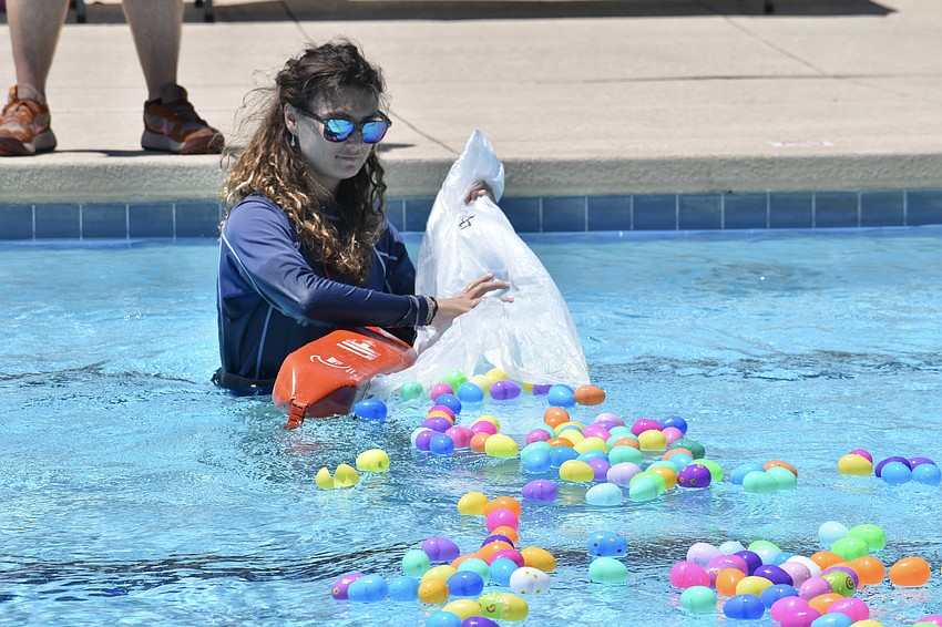 Elizabeth Meier fills the pool with eggs.