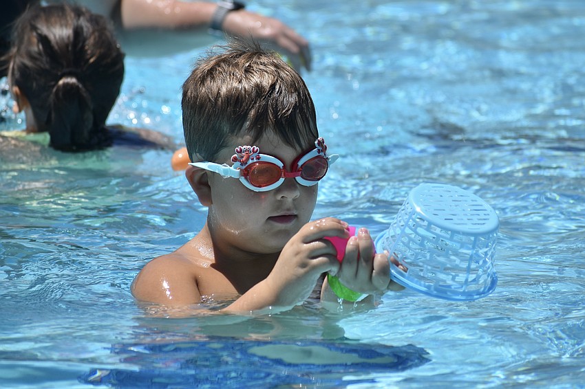 Clark Horton, 5, finds an egg.
