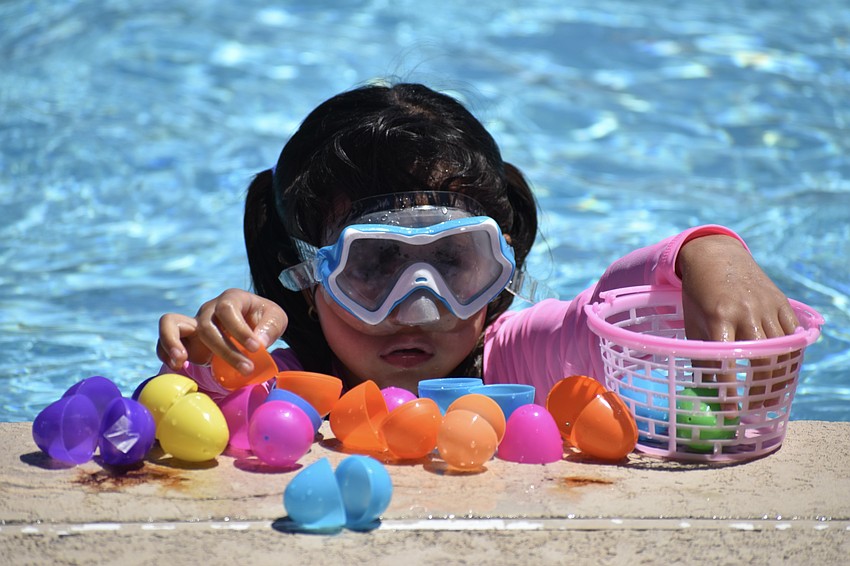 Antonella Pernalete, 7, looks over her collection.