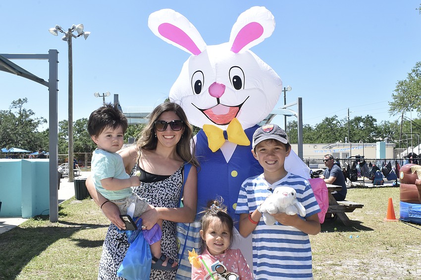 The Wades, 1-year-old Parker, mom Celia, 3-year-old Skyler and 8-year-old Bradley meet the Easter Bunny.