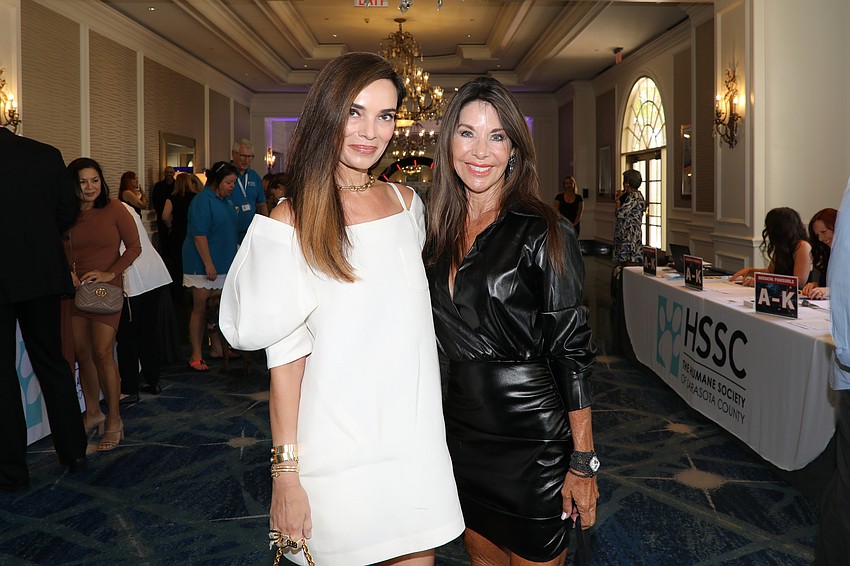 Mission Pawssible co-chair Liebe Gamble with board President Janet Boyden