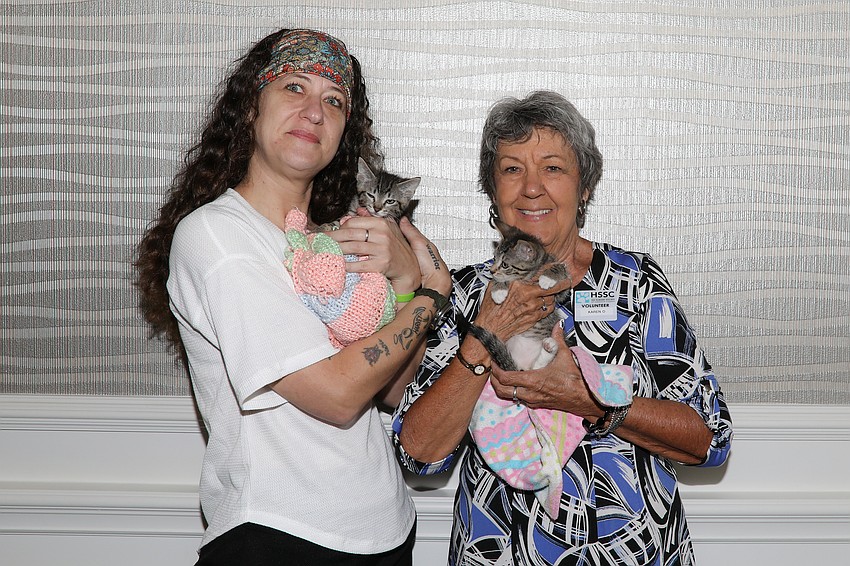 HSSC Cat Lead is Tanya Kopp who is photographed with volunteer Karen Owens and a couple of cool kitties.