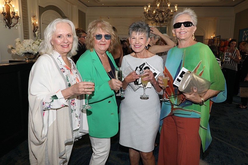 Pam Drake, Darlene Zdenek, Pat Boyer and Darlene LaForge celebrate the Humane Society.