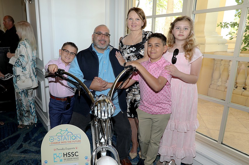 The Salvatore family: Austin, Ty, Iryna, Lucas and Ivy who donated this e-bike.