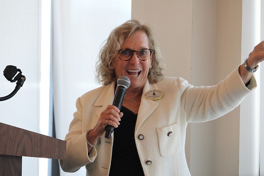 Branch President Wilma Davidson applauds the awardees.