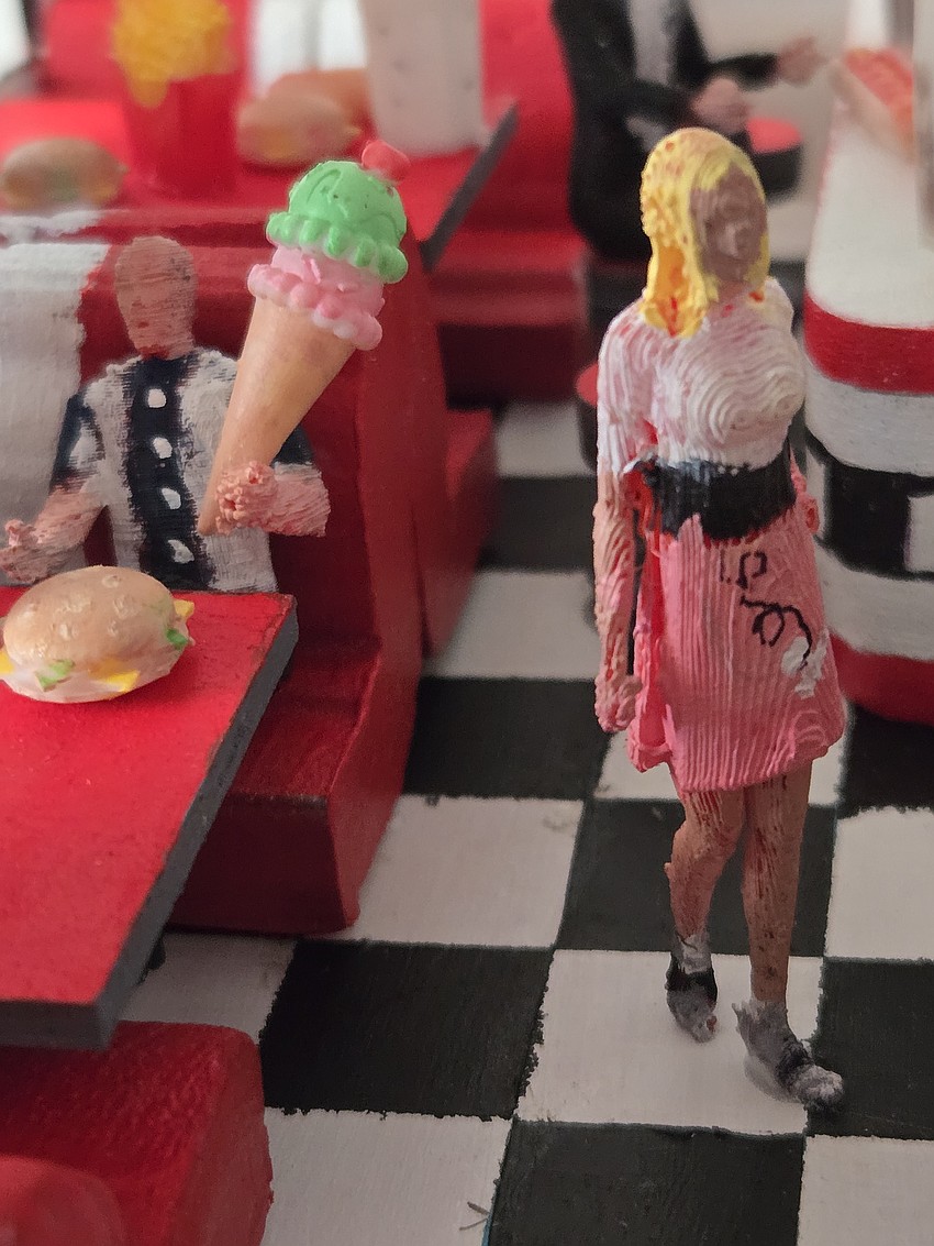 Seventh grader Layla Loeffel and her brother, fifth grader J.D. Loeffel, hand-painted their car themed after a 1950s diner.