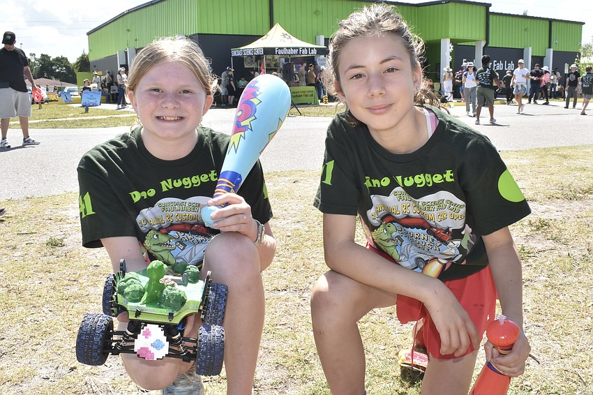 Fifth graders Cameron Cuff and Riley Thomas created a car featuring a dinosaur enjoying a meal.