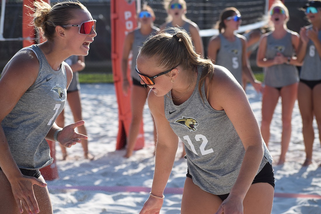 Cardinal Mooney's No. 1 pairing, Kelsey Fisher and Izzy Russell, celebrate scoring against Bradenton Christian in a 2-0 win on April 9.