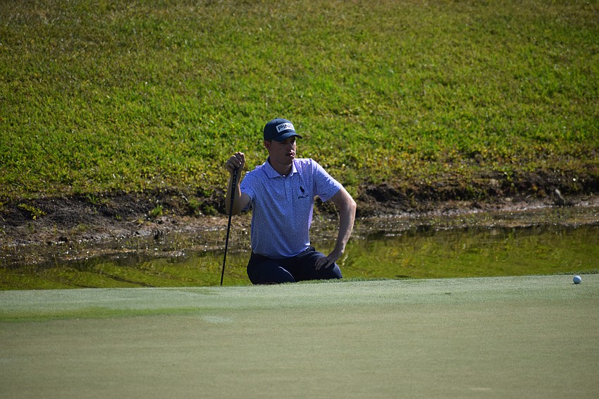 Trevor Werbylo studies his putt on No. 9 at Lakewood National during the first round of the LECOM Suncoast Classic Wednesday. Werbylo finished with a 75.