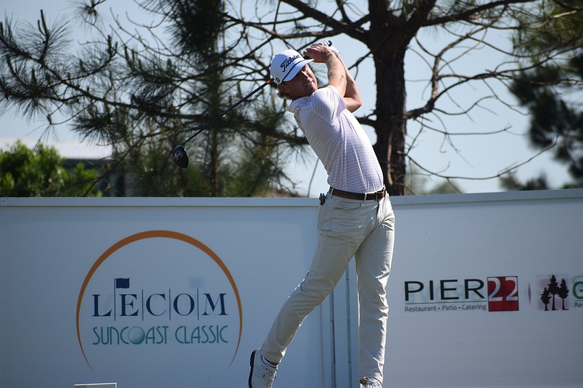 Samuel Anderson hits a tee shot at No. 10 at Lakewood National during the opening round of the LECOM Suncoast Classic Wednesday. Anderson shot 3-under 68.
