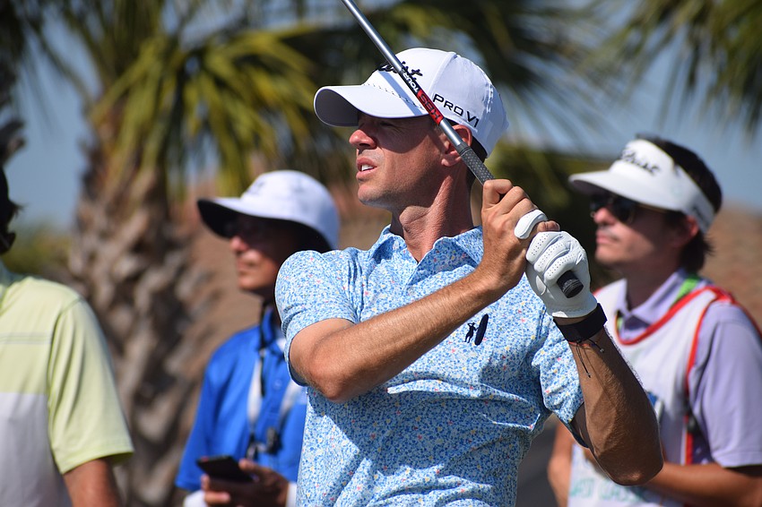 Jose Fernandez Valdes watches his tee shot on No. 14 at Lakewood National Thursday. He shot 2-under 69 and is tied for the tournament lead through two rounds.