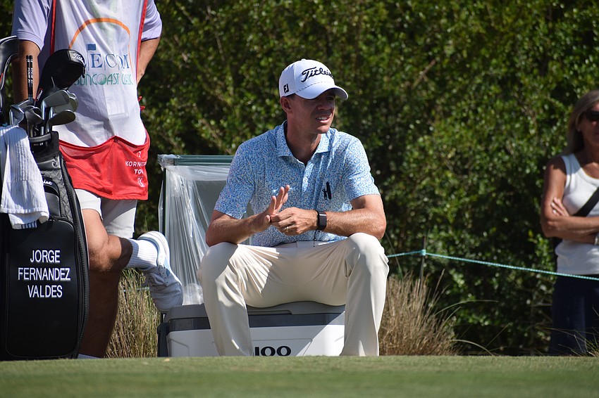 Jose Fernandez Valdes takes a break by resting on a cooler during the second round of the LECOM Suncoast Classic. Fernandez Valdes (-12) has led after each of the first two rounds.