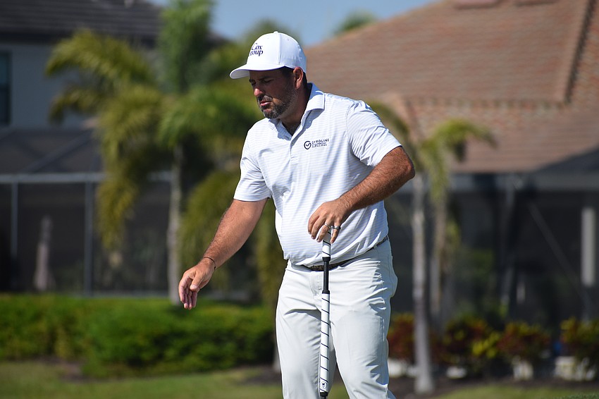 Roberto Diaz grimaces after missing a putt on No. 11 at Lakewood National Thursday. Diaz shot a 1-over 72 and missed the cut.