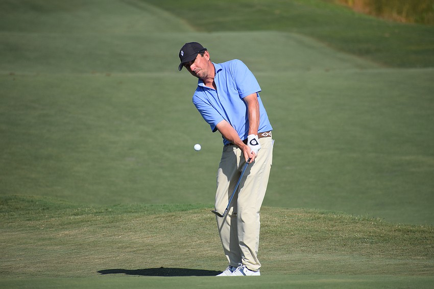 Paul Haley II nearly holes out on a greenside chip on No. 11 at Lakewood National. Haley II missed the cut after shooting 1-over-par through the first two rounds.