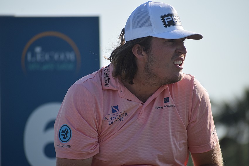 Neal Shipley, the 2024 Masters Tournament Low Amateur, tries to see where his drive landed on the par-5 No. 6 at Lakewood National. Shipley is tied for fourth place in the LECOM Suncoast Classic.