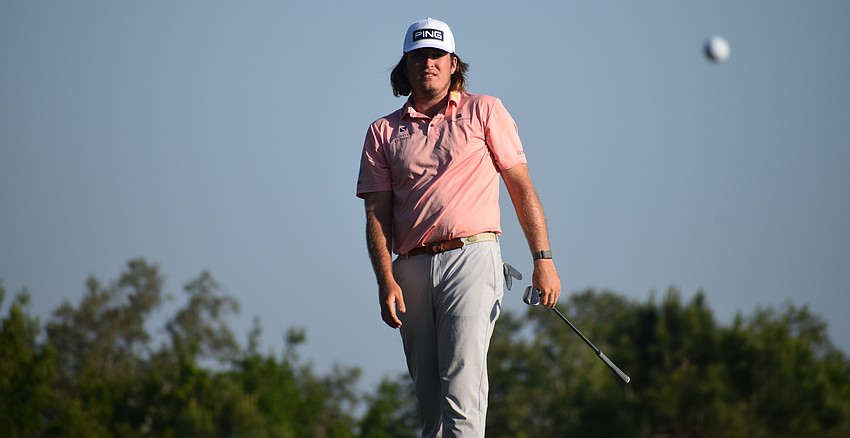 Neal Shipley watches his chip shot go toward the pin on No. 6 at Lakewood National. Shipley would go on to make birdie on the hole.