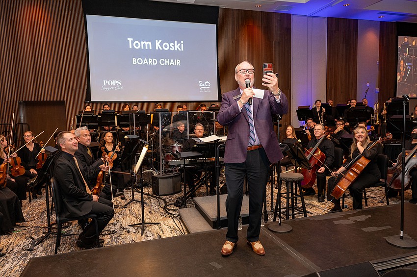 Board Chair Tom Koski gets the program started.