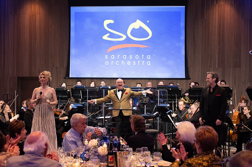 Guest singer Scarlett Strallen, guest conductor Stuart Chafetz and guest singer Hugh Panaro