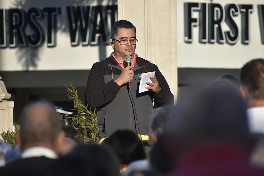 Antonio Leal-Olmedo, lay leader of Church of the Redeemer's Hispanic congregation, speaks at the 10th station.