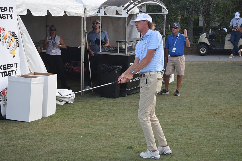 Mark Goetz chips onto the 17th green after his tee shot sailed into a beverage tent during the third round of the LECOM Suncoast Classic on Friday.