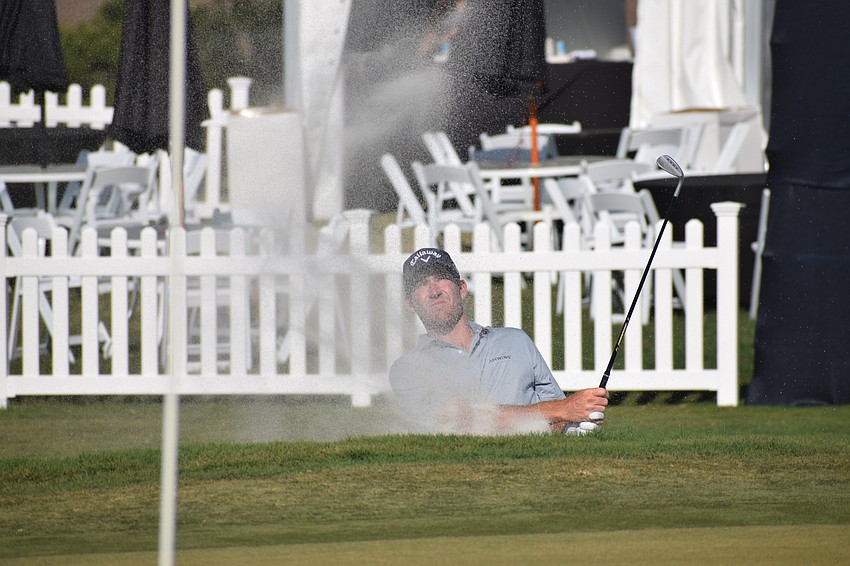 Robby Shelton battles with the greenside bunker on No. 18 at Lakewood National during the third round of the LECOM Suncoast Classic on Friday evening.