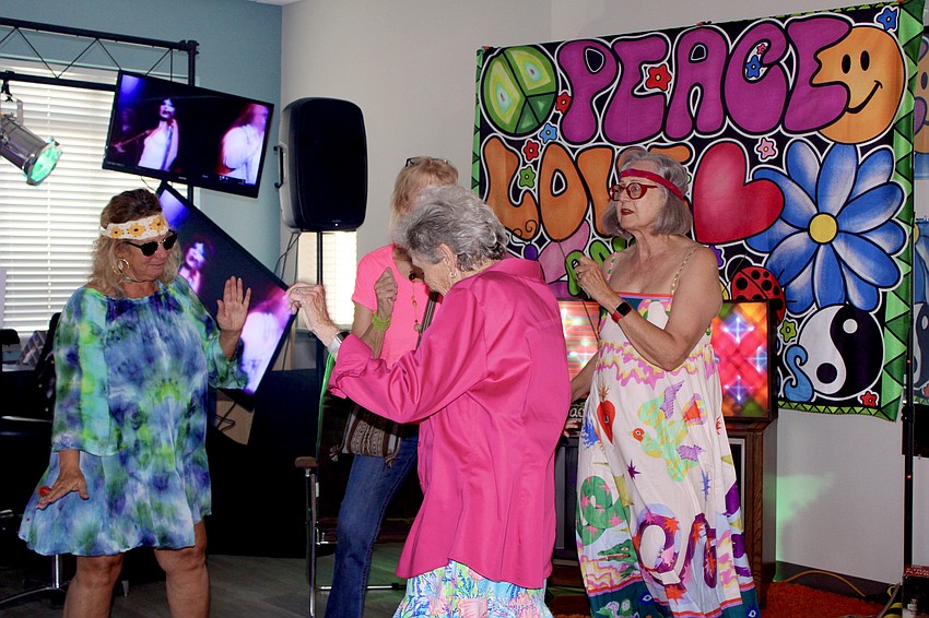 Paradise Center members boogie down with a 70s-themed farewell party.
