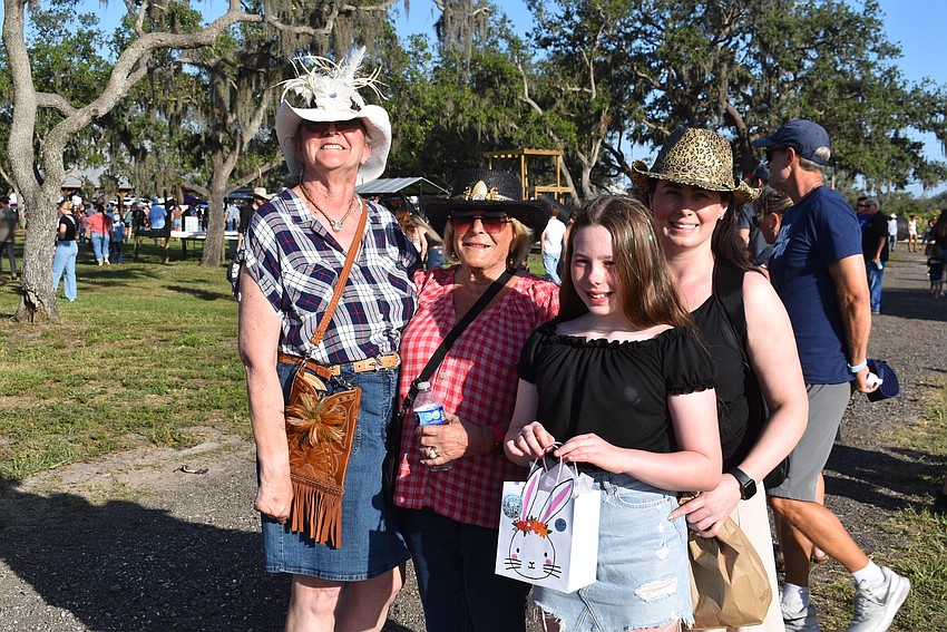 Bradenton's Mickey Wilson-Skarr and Northern Ireland's Dee Carr, Maureen McEvoy and Lacey-Lou McEvoy attend the Dakin Bull Bash. Carr has a second home in Bradenton. The hats are from Wilson-Skarr's wardrobe.