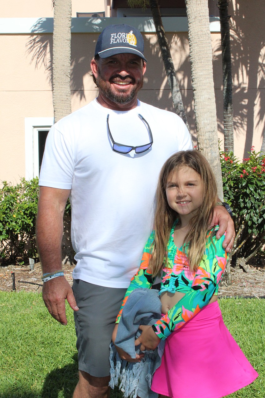 Jake and Josie, 9, Drost enjoy a day of Easter fun at Sand Cay.