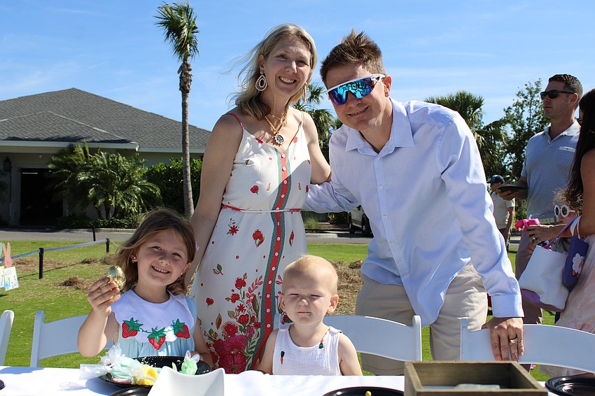 The Sandstrom family takes in the family fun at the Longboat Key Club Resort. Anneliese and Fredrik said it was a big year for the youngest family members, as soon-to-be-2-year-old Alexander experienced his first holiday out celebrating and Anja, 6, just lost her first tooth.