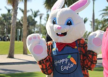 The Easter Bunny offers encouragement to the families joining the egg hunt at Longboat Key Club Resort.