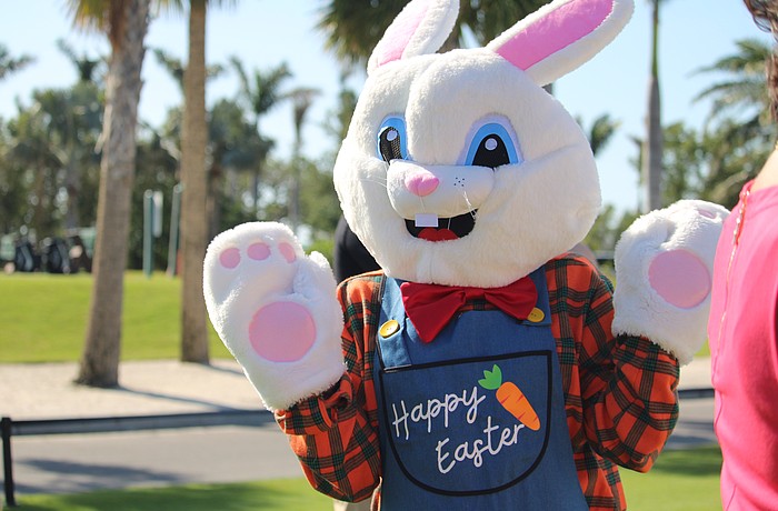 The Easter Bunny offers encouragement to the families joining the egg hunt at Longboat Key Club Resort.