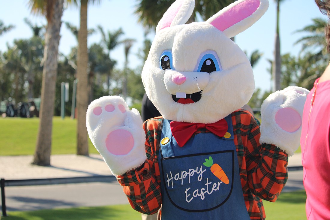 The Easter Bunny offers encouragement to the families joining the egg hunt at Longboat Key Club Resort.