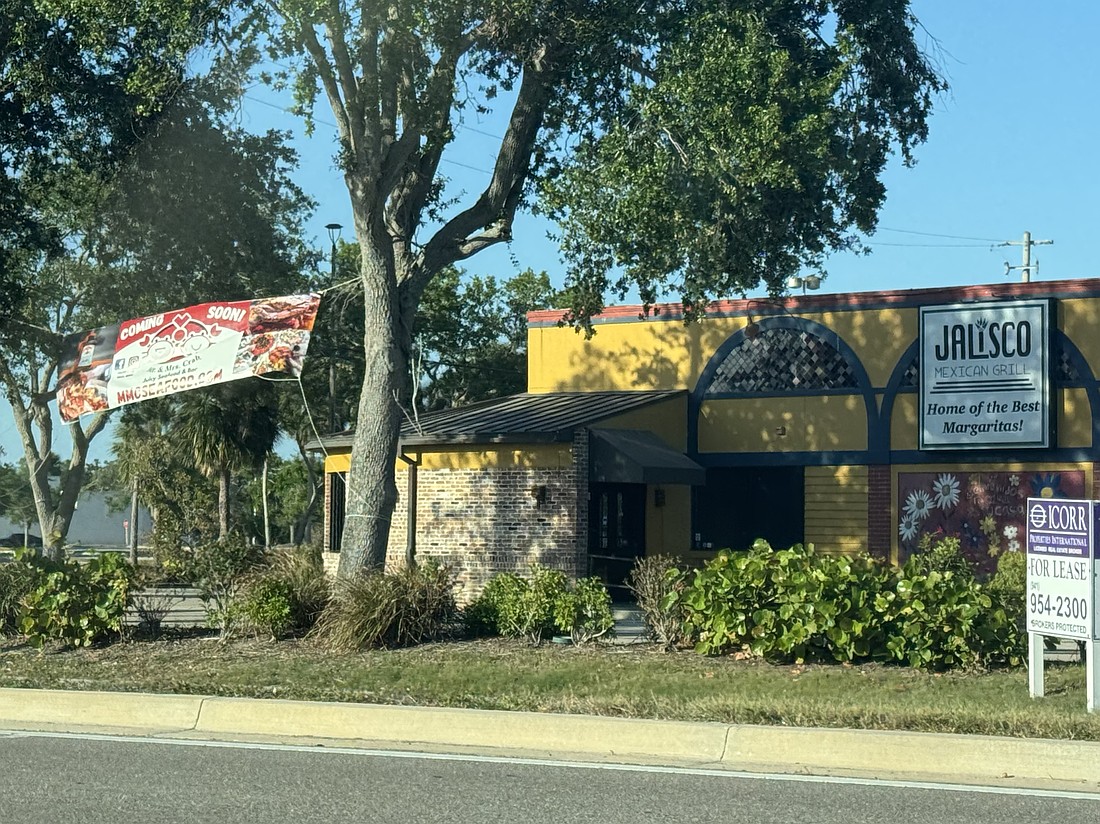 A sign says Mr. & Mrs. Crab is "coming soon" to 8389 S. Tamiami Trail in Sarasota.
