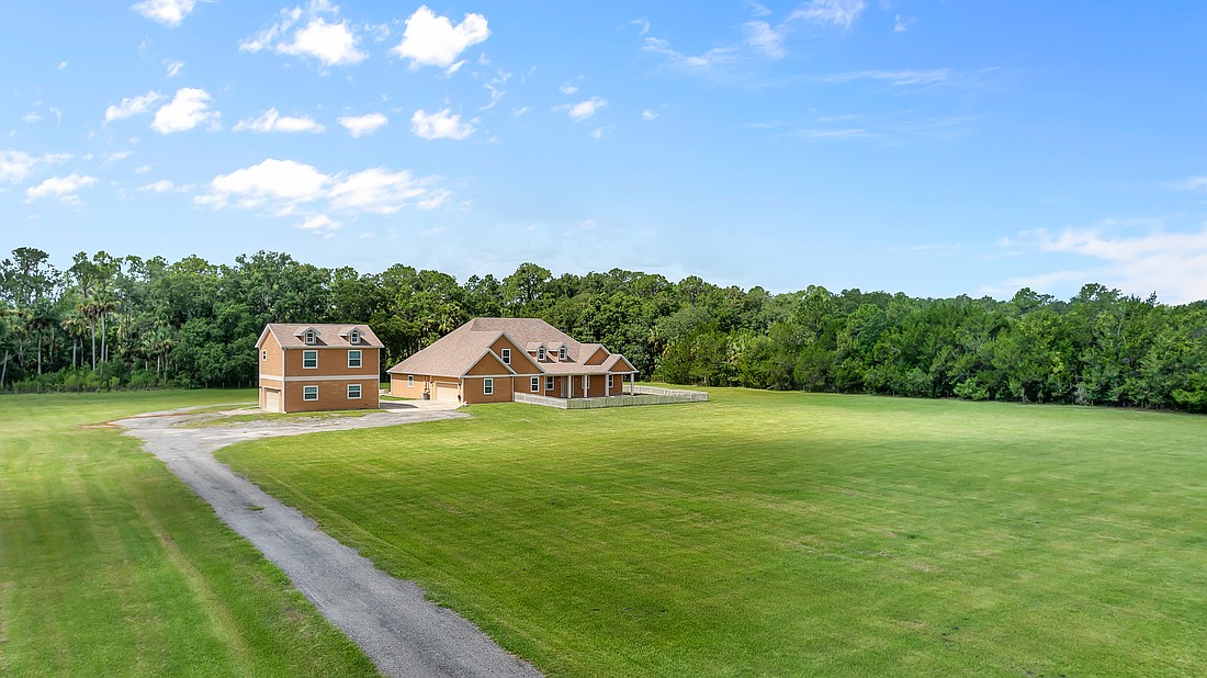 Built in 2017, the house is a 4/4 and has a pool, a detached two-car garage with a separate apartment and 3,821 square feet. Photo courtesy of Dawn Monroe/Realty Pros Assured