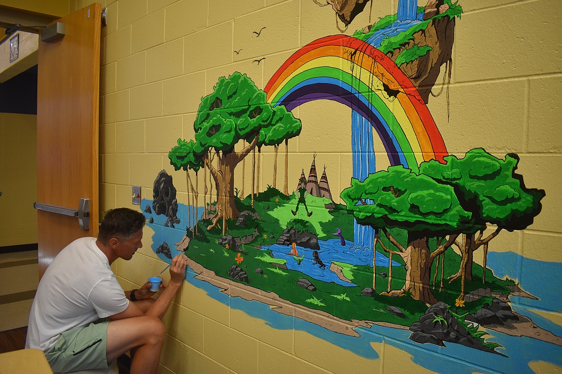 Alex Benson says the current mural is much more detailed and will take more time than previous projects. His goal is to have it complete over the summer, ready for the 2025-2026 school year.