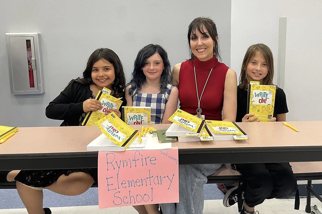 Rymfire Elementary School contributors attend the Josh Crews book launch. Courtesy photo