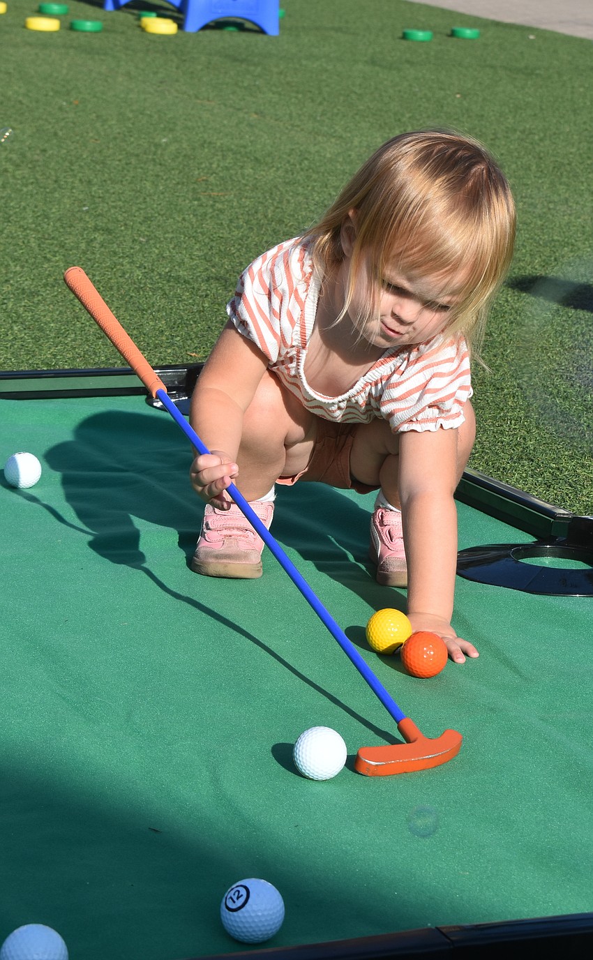 It is fitting that UTC's The Green hosts a little golf fun for Vivian Bragg.