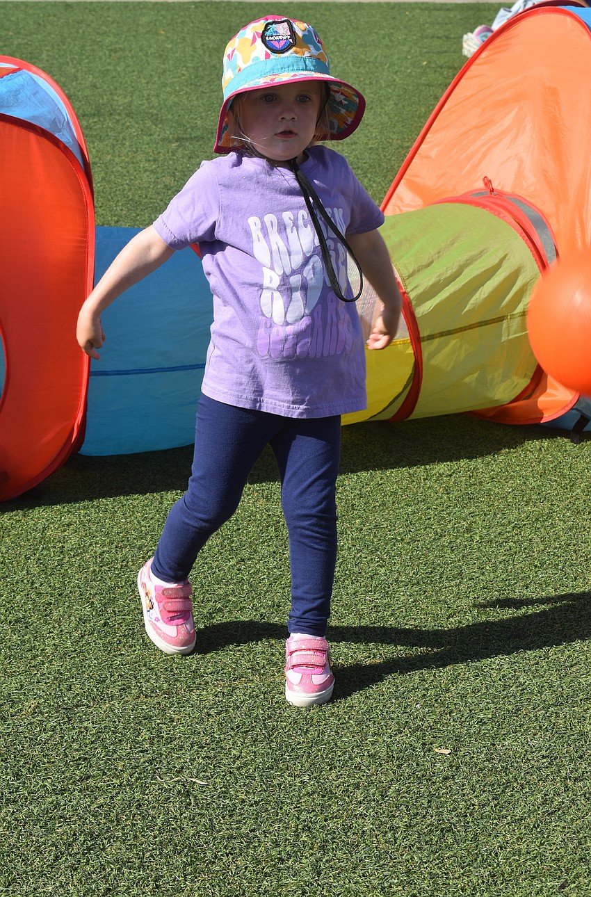Besides playing at UTC Kids Club, 2-year-old Harper Kosek likes going up and down escalators at the mall.