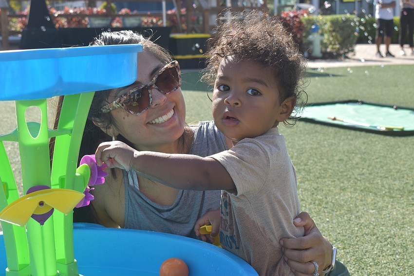 Jessica DuBose enjoys bringing her son Ezra to play with the variety of different games provide at UTC Kids Club.