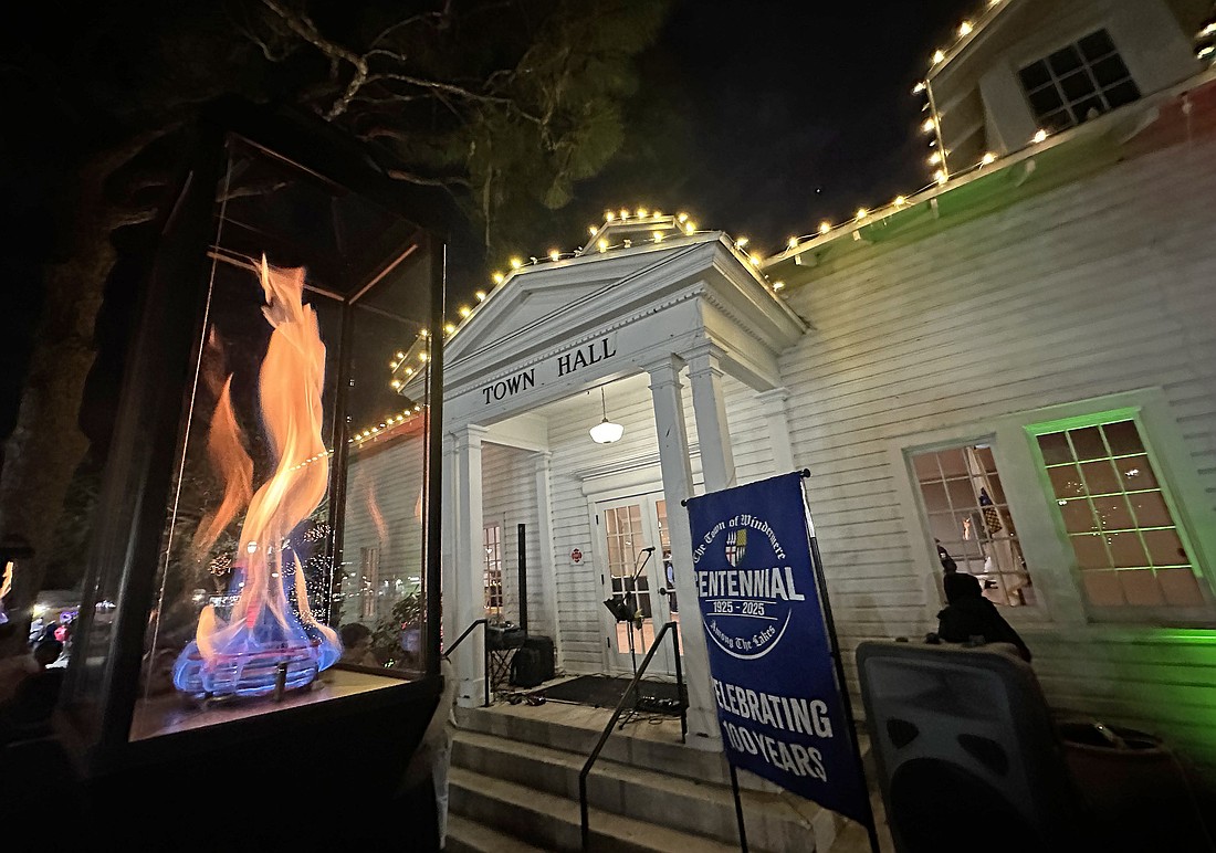 The torches are a symbol of light for the next 100 years, Centennial Planning Committee member CT Allen said.