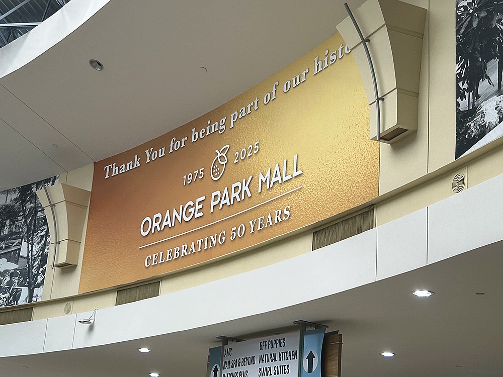 Signs are up inside the Orange Park Mall to mark its 59th anniversary. The mall opened opened Sept. 24, 1975.