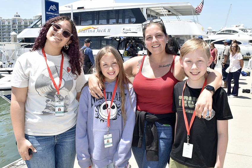 Sophia Scherry, her sister Adilyn Scherry, 10, mom Jameson Scherry, and brother Nieko Scherry, 11