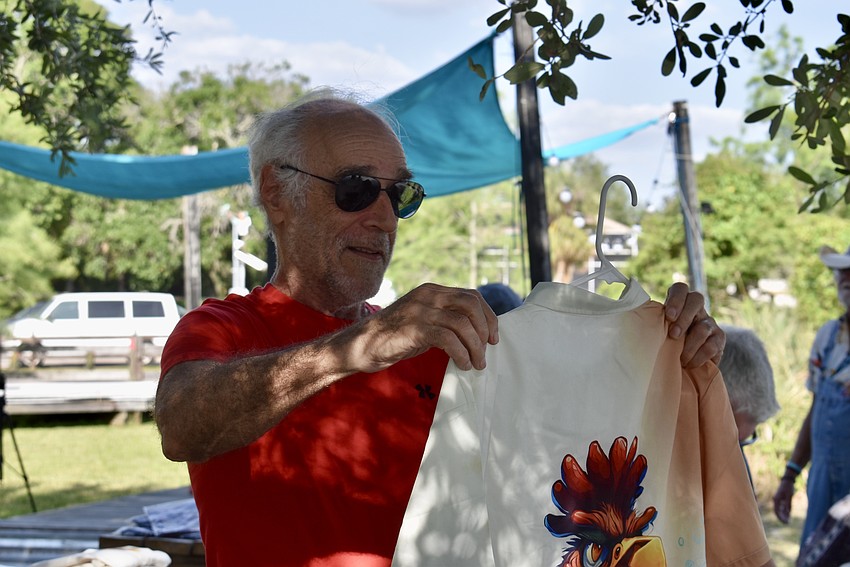 Sarasota's Robert Lee checks out the merch.