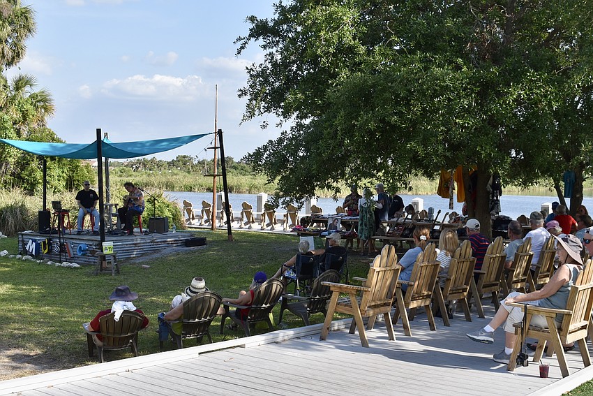 A crowd gathers for live music at Jiggs Landing April 24.